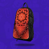 The Ember Bloom Skin zipped onto a black Lunchbox hydration pack, featuring a vibrant red and orange symmetrical mandala with a geometric flower-of-life pattern, floating with a drop shadow against a branded purple background.