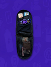 Open black Extra Storage Skin 2.0 for a Lunchbox hydration pack showing internal mesh pockets and organizational compartments against a purple background.