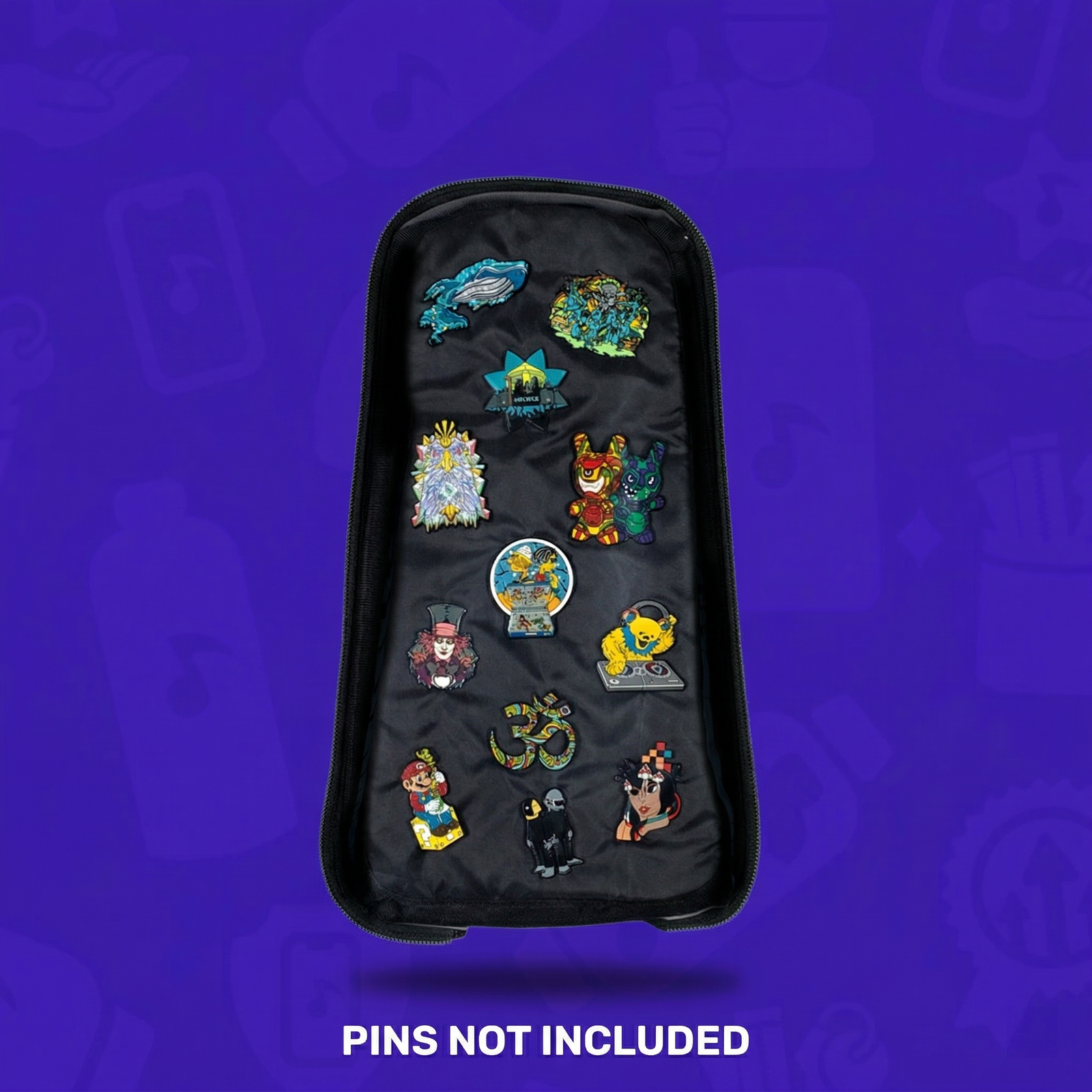 A close-up lifestyle shot of a Lunchbox hydration pack with the "Pin Skin" attached, featuring a dense collection of enamel pins including a "Subtronics" cyclops and a "Ganja White Night" logo, protected behind a clear acrylic shell at a music festival.