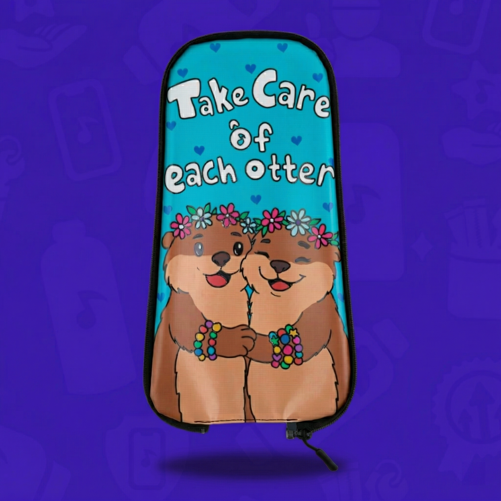 Lunchbox Packs hydration pack skin featuring two illustrated cartoon otters hugging and wearing colorful kandi bracelets and flower crowns. The design includes the text "Take Care of Each Otter" on a blue and purple background.