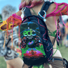 Festival attendee wearing the Lunchbox hydration pack featuring the official EDC Orlando 2026 custom skin.