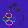 Coils of orange, green, pink, and blue EL wire for Lunchbox hydration packs, shown with a black USB adapter cable and a 3-way lightshow splitter on a purple background.