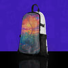 A Lunchbox hydration pack with the Nebula Skin, featuring a colorful dreamscape design with orange and blue swirls, displayed on a white pack against a vibrant purple background.